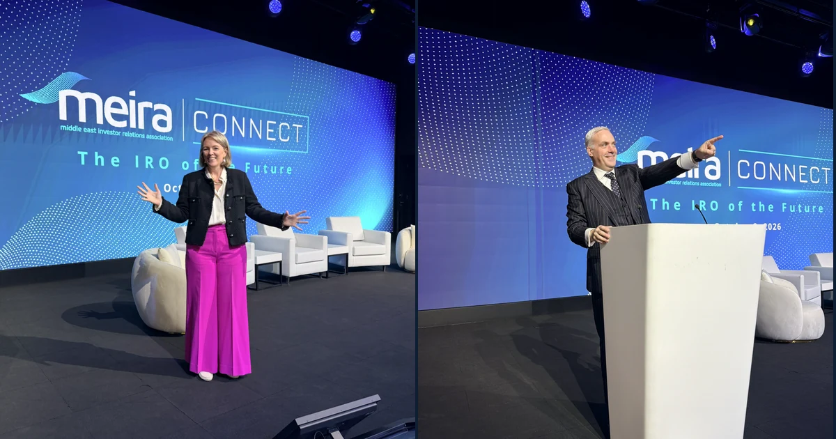 Holly Joint in pink trousers and Ewan MacLeod presenting at MEIRA Connect in Dubai.